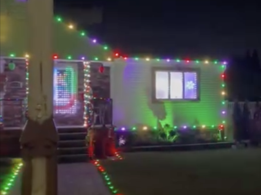 A home showing the Permanent Outdoor Lights installed facing out from the house.